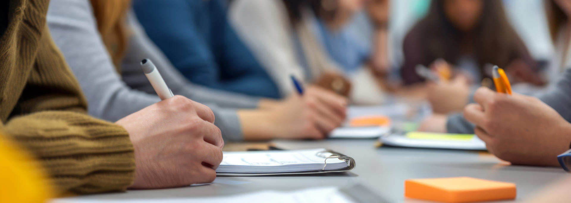 People taking notes 